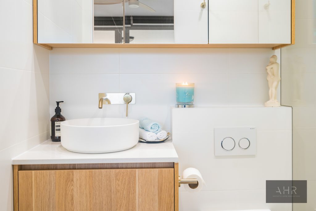 wooden cabinet white bathroom