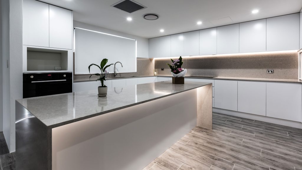 a kitchen with a marble countertop renovation